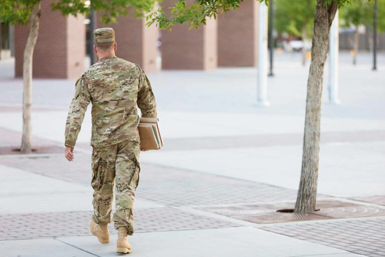 american soldier with books