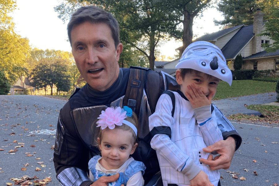 chris holding his kids