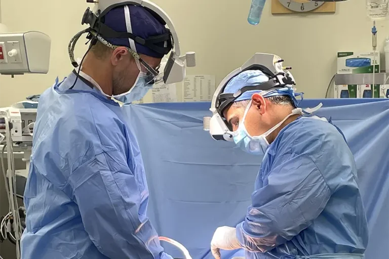 Two surgeons using AR in spine surgery