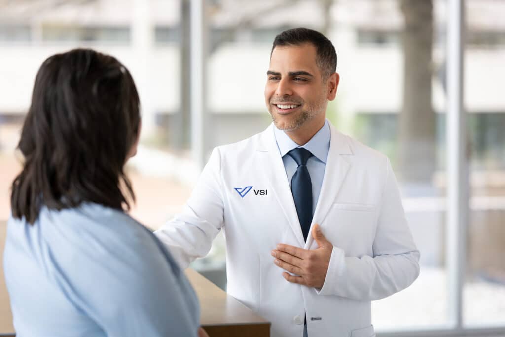 doctor speaking to a patient