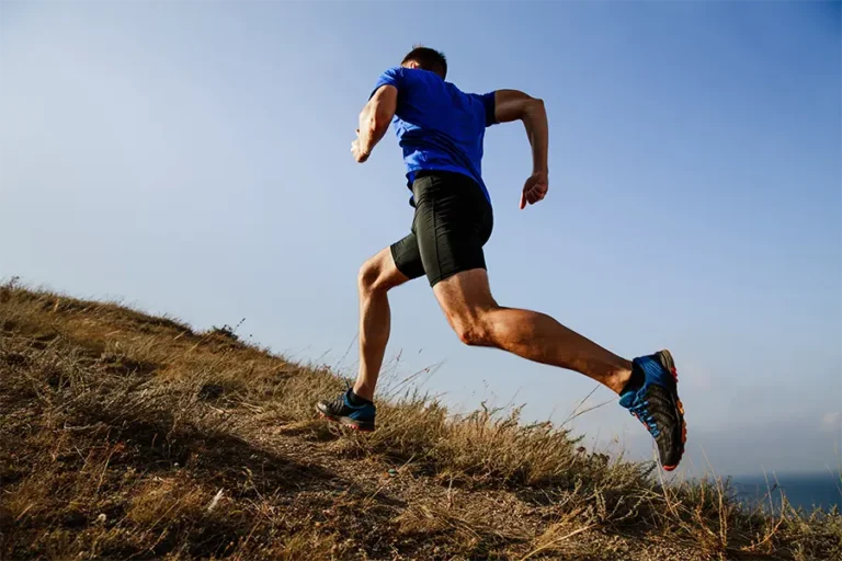 male dynamic running uphill