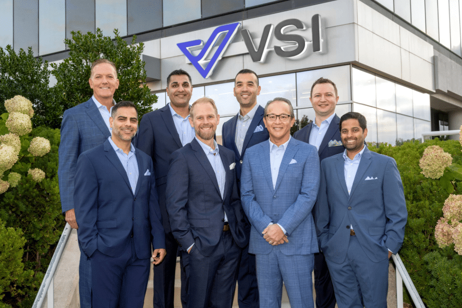 VSI team in front of the building