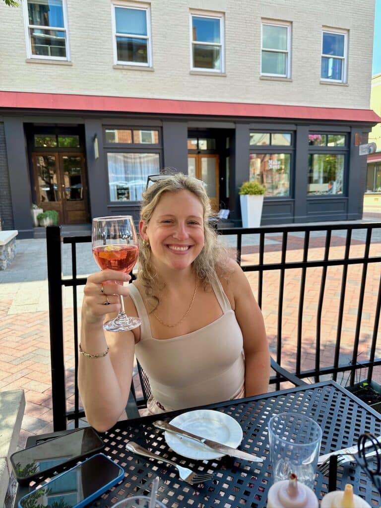 Caroline enjoying a drink outside