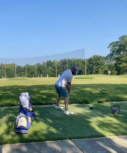 golfer swinging a club