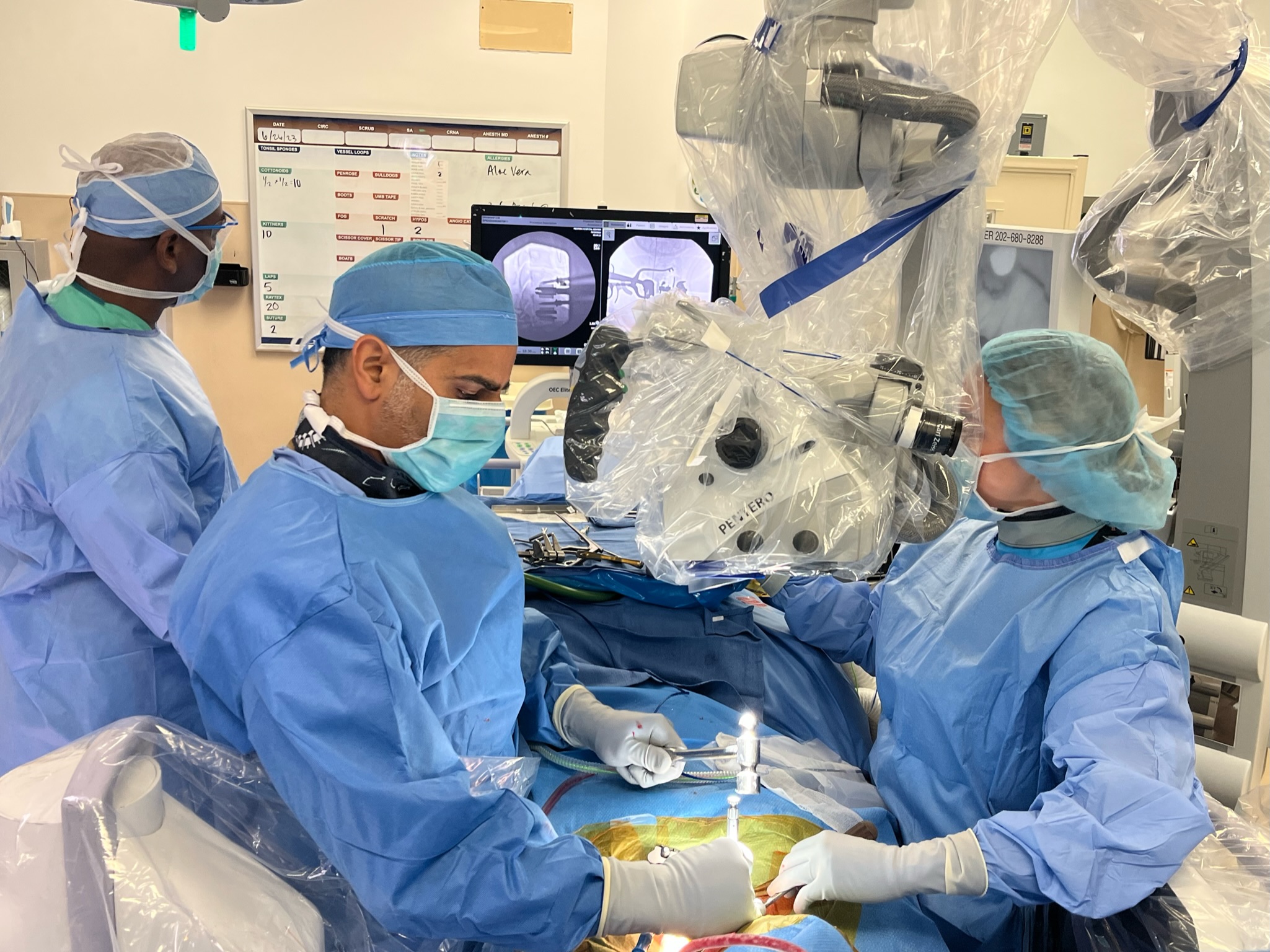 Dr. Jazini performing 4-level disc replacement surgery