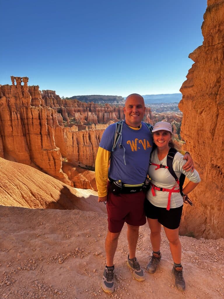 Chris hiking with his wife