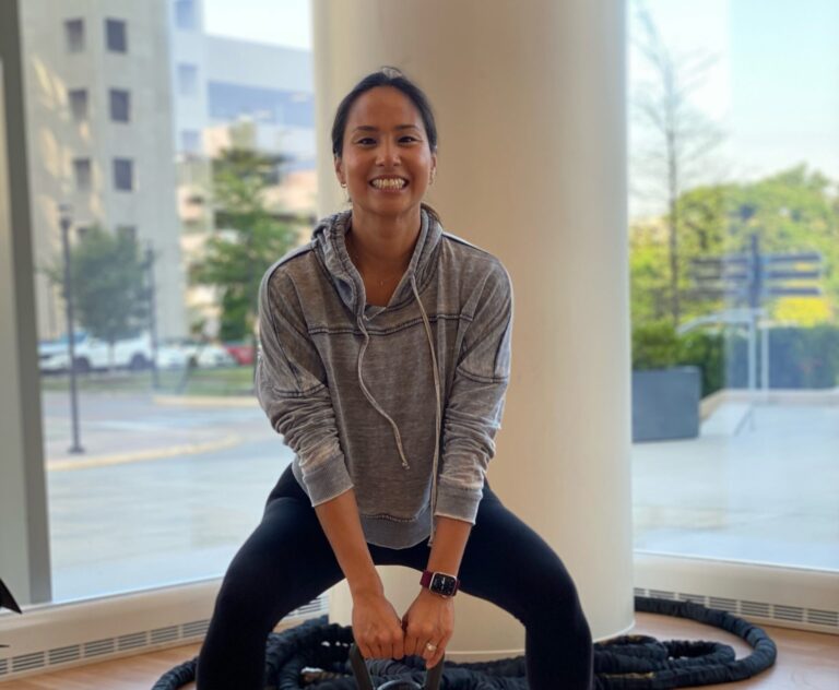 Woman working out using weights