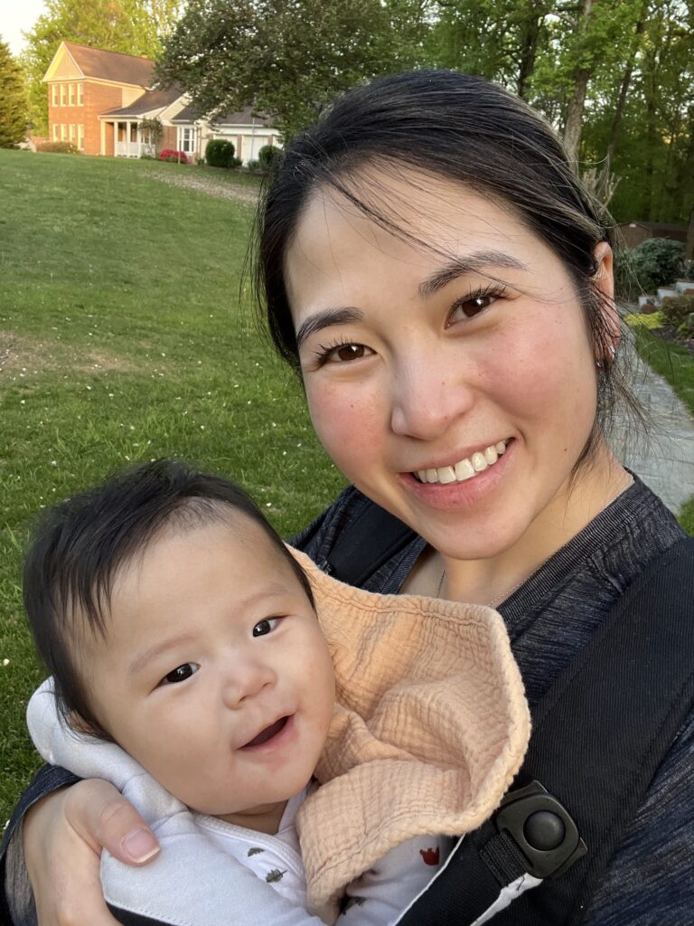 Mother and new baby in a carrier