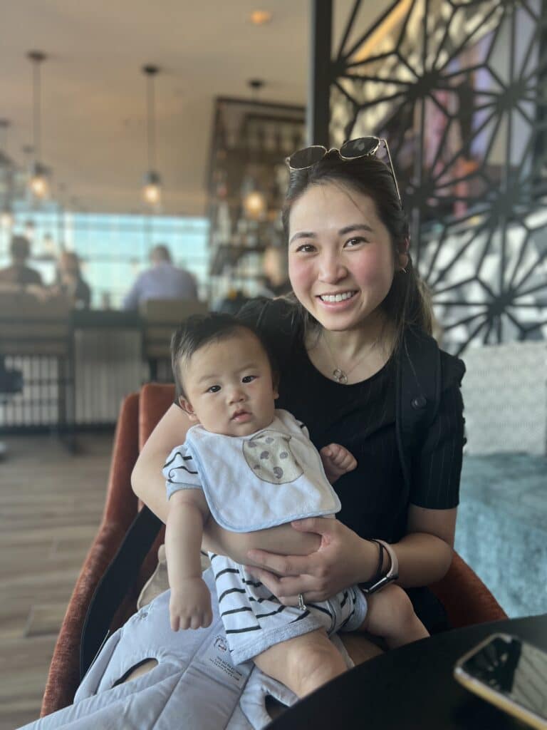 Mom and her three-month-old at a restaurant