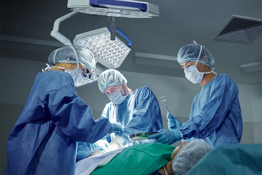 teamwork, healthcare and doctors working on a surgery for medical treatment