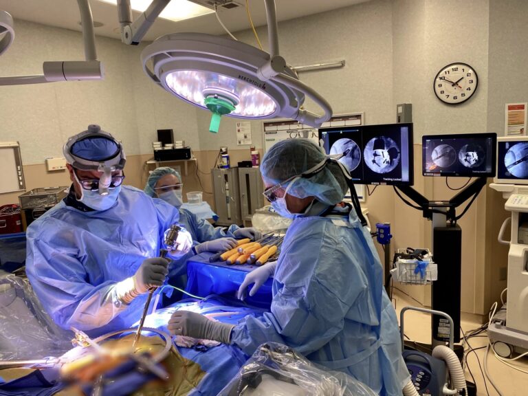 Spine surgeon performing ADR surgery