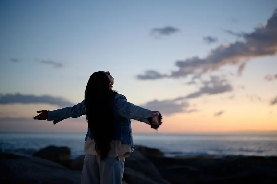 young woman breaking free from bertolotti syndrome pain